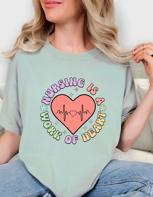 Comfort Colors® 'Nursing Is a Work of Heart' T- Shirt | Nurse Life Graphic Shirt | Inspirational Nurse Graphic Tee | Nursing Heart Design Shirt