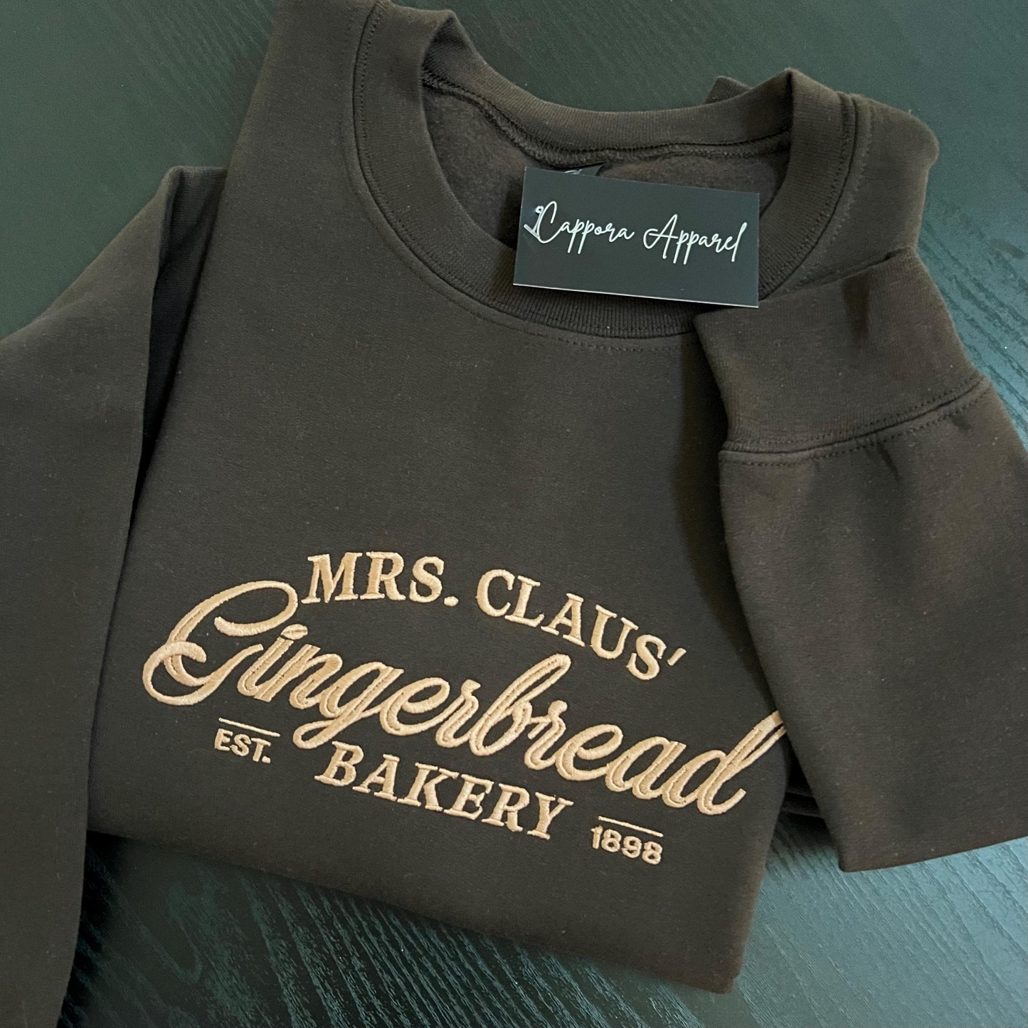 Mrs. Claus’s Gingerbread Bakery Crewneck Sweatshirt – Embroidered Christmas Bakery Design – Festive Holiday Cozy Gift for Her