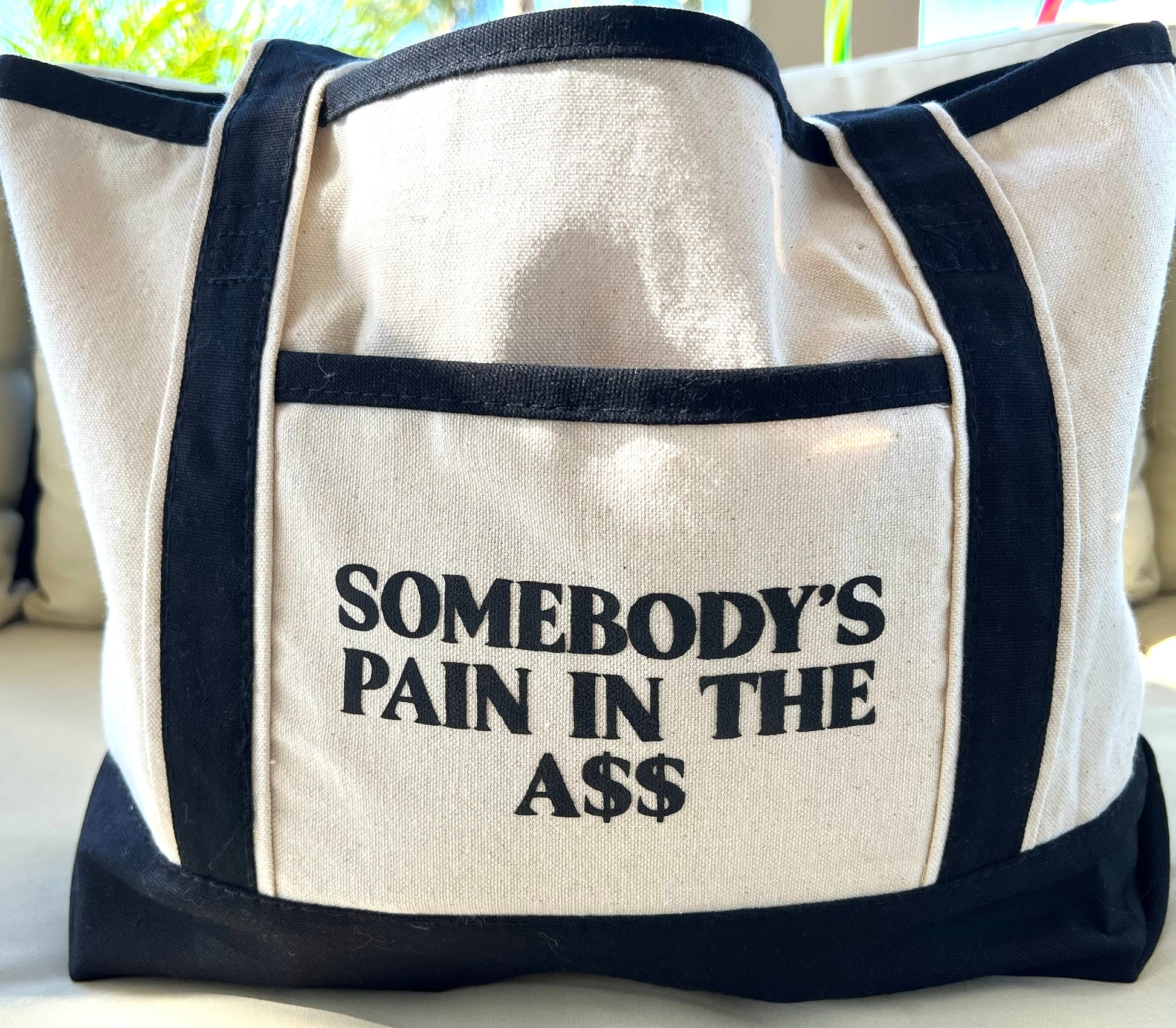 Somebody’s Pain In The Ass Tote Bag – Funny Canvas Shopper Bag, Sassy Reusable Market Tote, Bold Quote Gift for Women & Friends