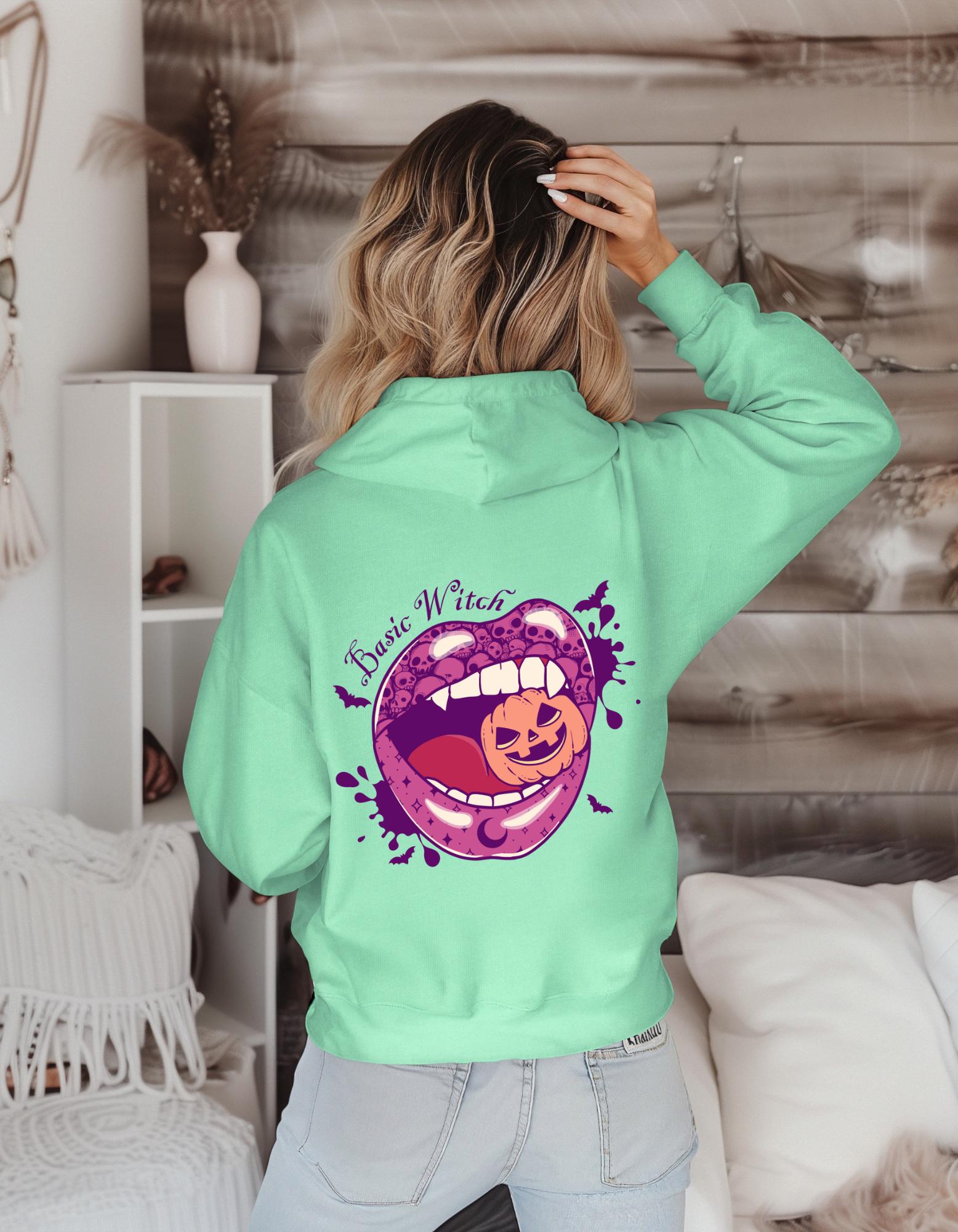 Basic Witch Hoodie – Gildan Sweatshirt with Lips & Skulls Eating Pumpkin Graphic, Funny Spooky Halloween Fall Pullover